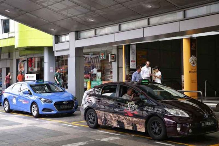 Cegah Virus Corona, Otoritas Angkutan Darat Singapura Bagikan 300 Ribu Masker ke Sopir Taksi