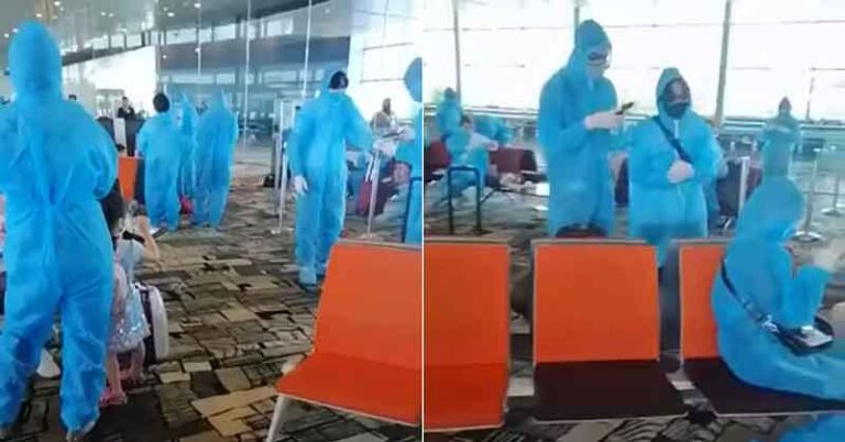 Penumpang Bandara Changi Gunakan Kostum Hazmat dan Tidak ada Jarak Sosial